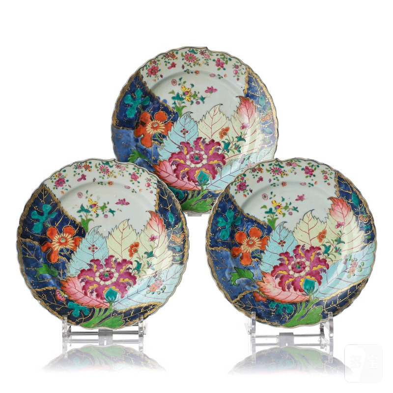 A set of three famille rose 'tobacco leaf' plates,